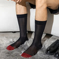 "Elegant men's black sheer dress socks with a bold red toe, over-the-calf fit from Eliot Grey Socks – The Crown Flame."