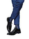 "Men’s luxury sheer dress socks in classic black with bold executive styling – The Regent by Eliot Grey Socks, inspired by London’s power and presence."