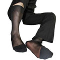 "Elegant over-the-calf black sheer socks for men, crafted with Wall Street-inspired sophistication – The Chancellor by Eliot Grey Socks."